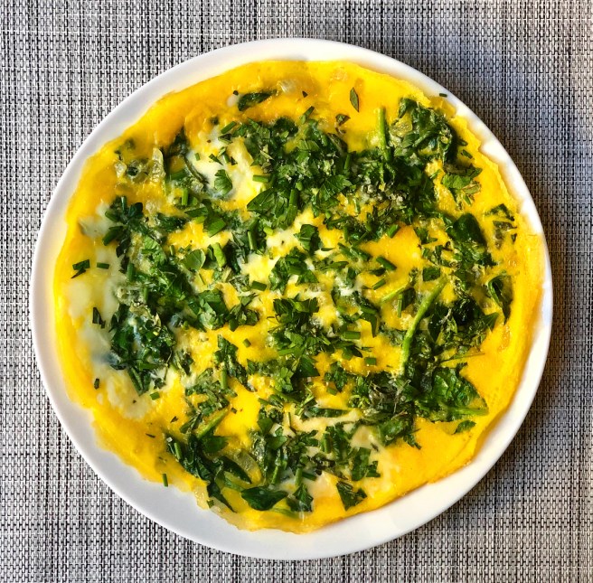 Flat omelet with spinach and&nbsp;herbs