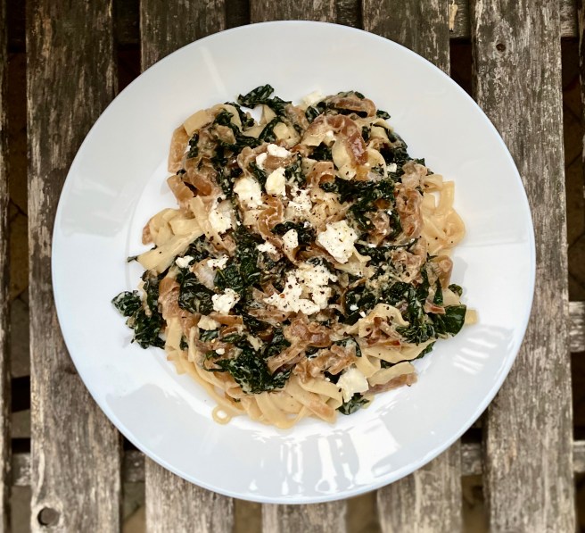 pasta with kale, caramelized onions, and goat&nbsp;cheese
