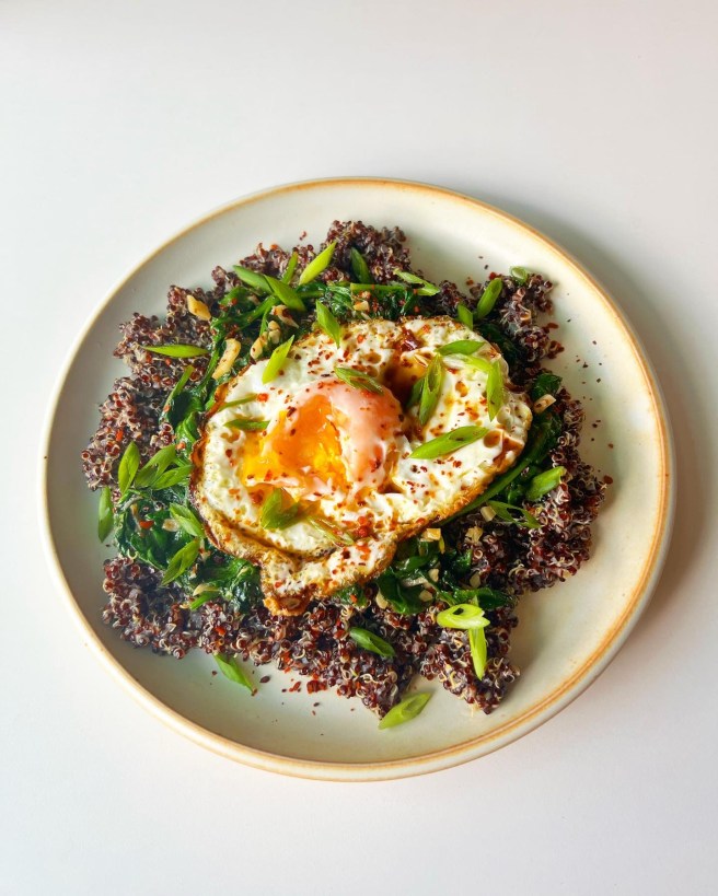 black quinoa with garlicky spinach and a fried&nbsp;egg